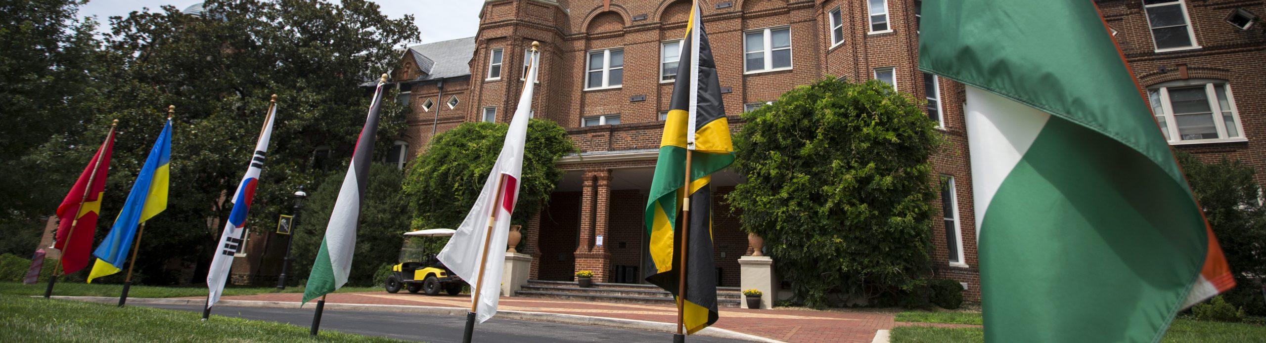 Photo of flags in front of Main Hall